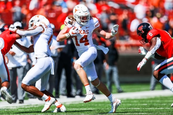 Receiver Brendan Schooler #14 of the Texas Longhorns runs the ball during the first half of the college football game against the Texas Tech Red Raiders on September 26, 2020.