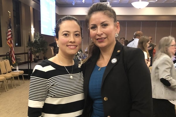 Tippetts and Contreras stand together at a Lone Star College event.