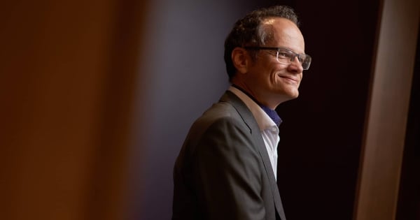 Mark Daley, chief AI officer at Western University, looks away from the camera. You can see his left side profile. He is a light-skinned man with dark hair and glasses.