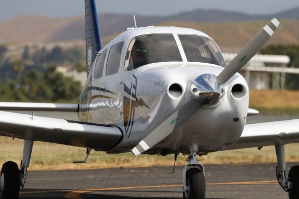 A flight instructor flies alongside a CBU student pilot.