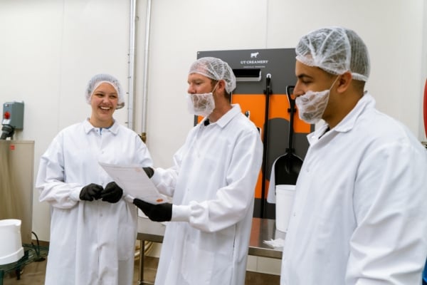 Faculty and students wear lab gear at the University of Tennessee creamery
