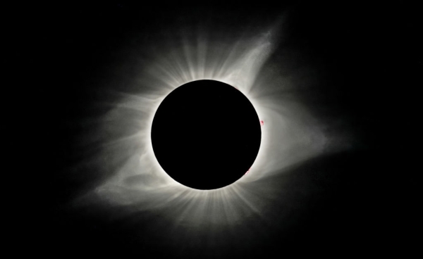 Varying shades of white light emanating from a black circle, set against a black background.