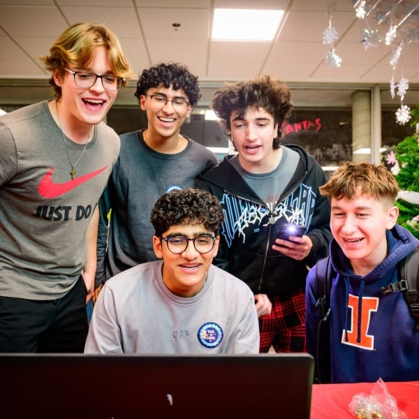 Five University of Illinois students sing during Dial-A-Carol on campus