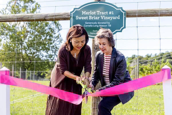 A photo of former Sweet Briar president Meredith Woo and SBC graduate