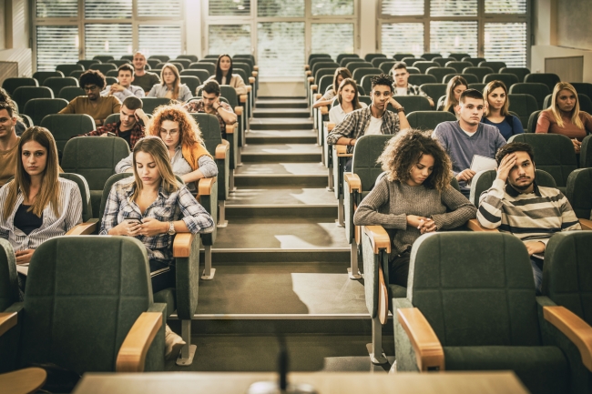 Bored and listless students in a lecture hall