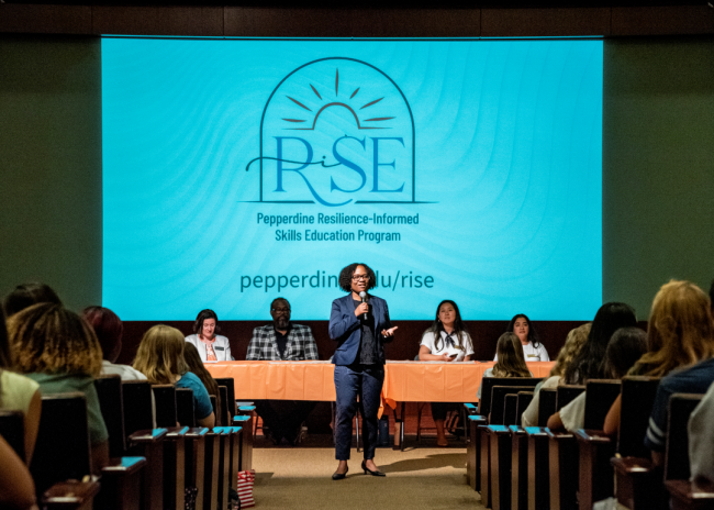 La Shonda Coleman, associate vice president at Pepperdine University, speaks in Elkins Auditorium to students for a RISE event.