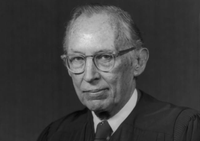 A black and white portrait of Supreme Court justice Lewis Powell, an older white man.