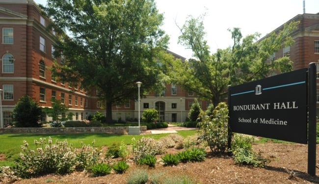A picture of part of the University of North Carolina at Chapel Hill's campus, with a sign saying "Bondurant Hall School of Medicine."