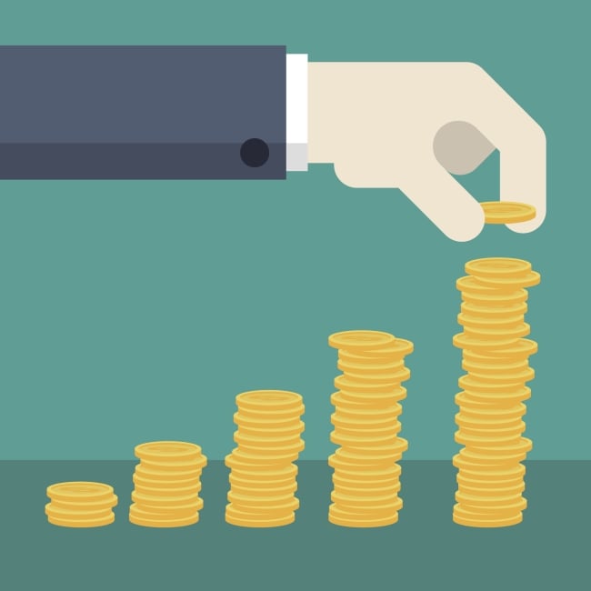 Illustration of five stacks of coins with a hand placing an extra coin on the last, tallest stack.
