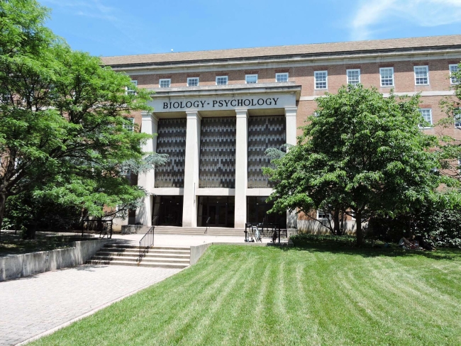 A photograph of a University of Maryland at College Park building with letters spelling "Biology - Psychology" above the entrance.