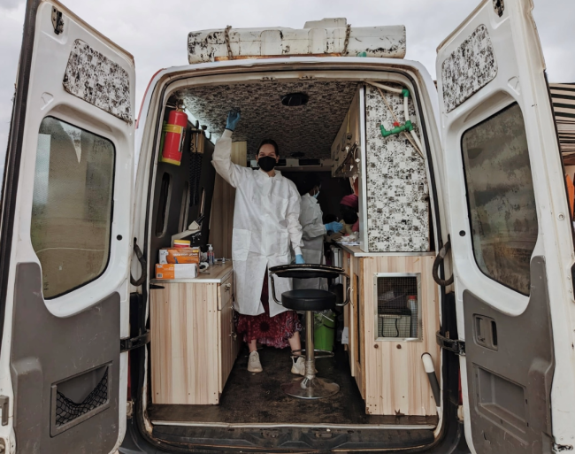 Emory University senior Alia Bly stands in the OKB Hope Foundation's mobile disease screening laboratory in Mobia, a rural community in the Ashanti region of southern Ghana. 