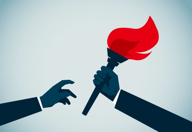 Illustration: a hand reaches out to another hand holding a bright red torch