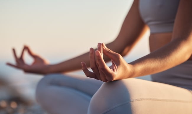 Woman, hands or lotus pose meditation on sunset beach