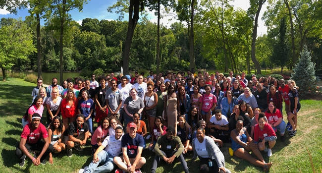 Flyer Promise Scholars at the University of Dayton smile for a photo.