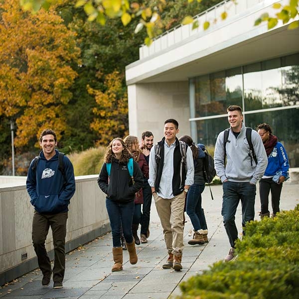 Brandeis students walking on campus