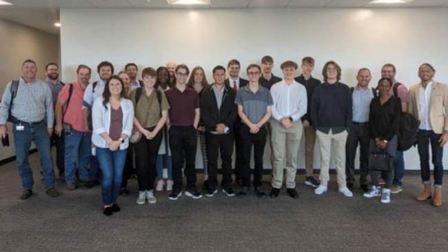 A group of Information Science and Technology Students smile for a photo.