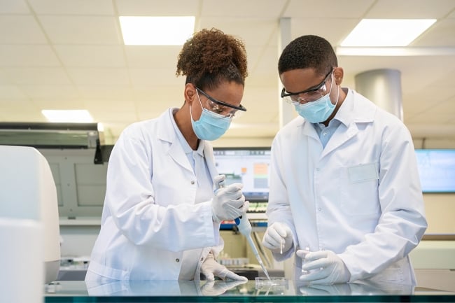 Stock photo of two people in a lab