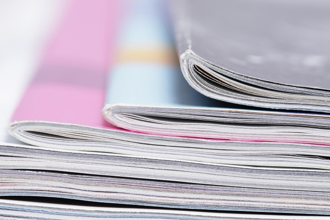 Stack of journals blurring at the top