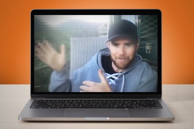 A photo illustration showing a photo of David Griffith-Jones on a laptop.