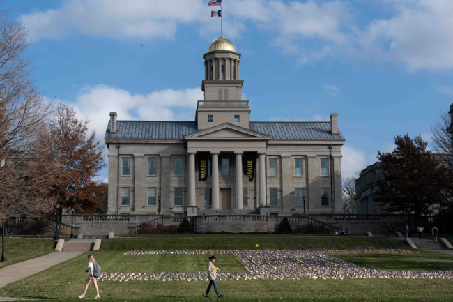 The University of Iowa campus lawn decorated with American flags for Veterans’ Day.