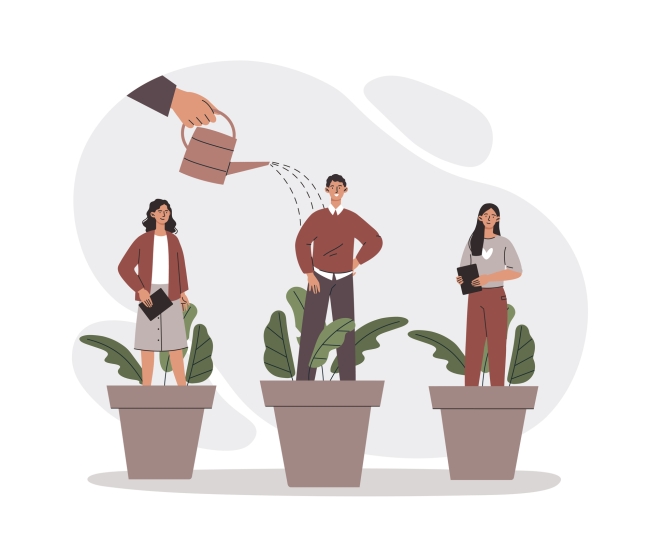 Two women and one man stand in a pot with plants while a hand above pours water from a watering can on them