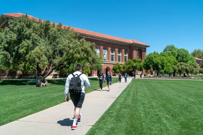 A photograph of students walking at the University of Arizona.