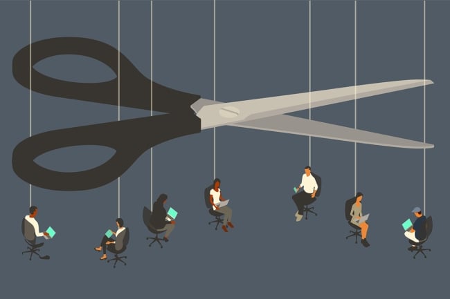 A huge pair of scissors hangs over strings holding up a group of workers