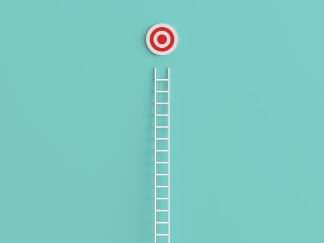 Ladder leading up to a red-and-white bull’s eye