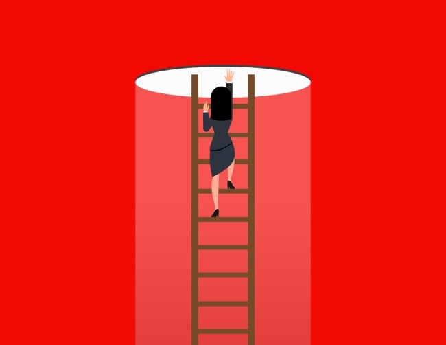 Woman climbing up ladder toward light emanating from a hole in the ceiling 