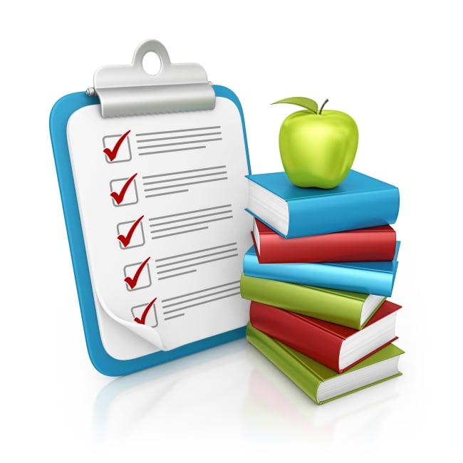 Stack of books with an apple on top sits beside a clipboard with a checklist