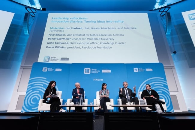 A panel of education and industry leaders discuss innovation districts at the World Academic Summit
