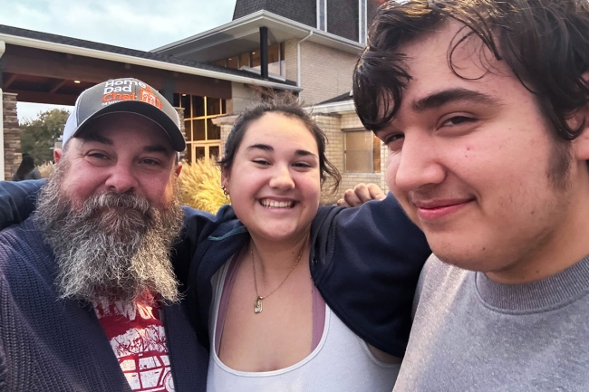 Shannon, Genevieve and Wyatt Carpenter people pose for a selfie outside their Missouri polling place.