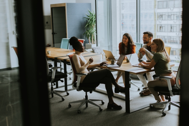 Young multiethnic start-up team working at the modern office