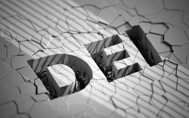 The letters DEI against the background of what appears to be a wall with many cracks.