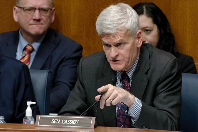 Senator Bill Cassidy gestures during a Senate committee hearing.