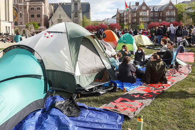 Tents are set up outside of the library at the University of Wisconsin–Madison