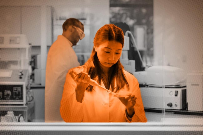 Diverse researchers working in a laboratory.