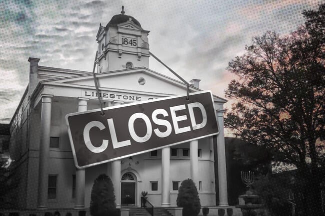 Limestone University with a closed sign on it.
