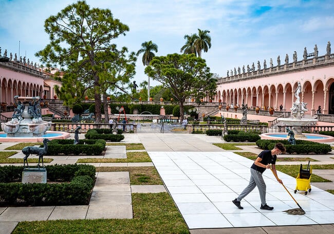 A worker cleans in the event area of the Ringling Brothers Museum in Sarasota, Fla.