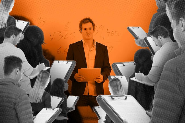 A professor with a large group of people holding clipboards around them as they teach.