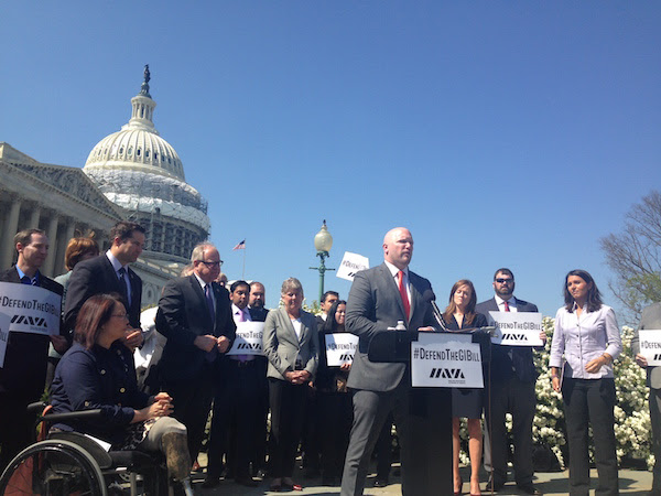 Iraq and Afghanistan Veterans of America founder and CEO Paul Rieckhoff speaks at a rally on Capitol Hill Thursday, April 14, protesting a cut to GI Bill benefits.