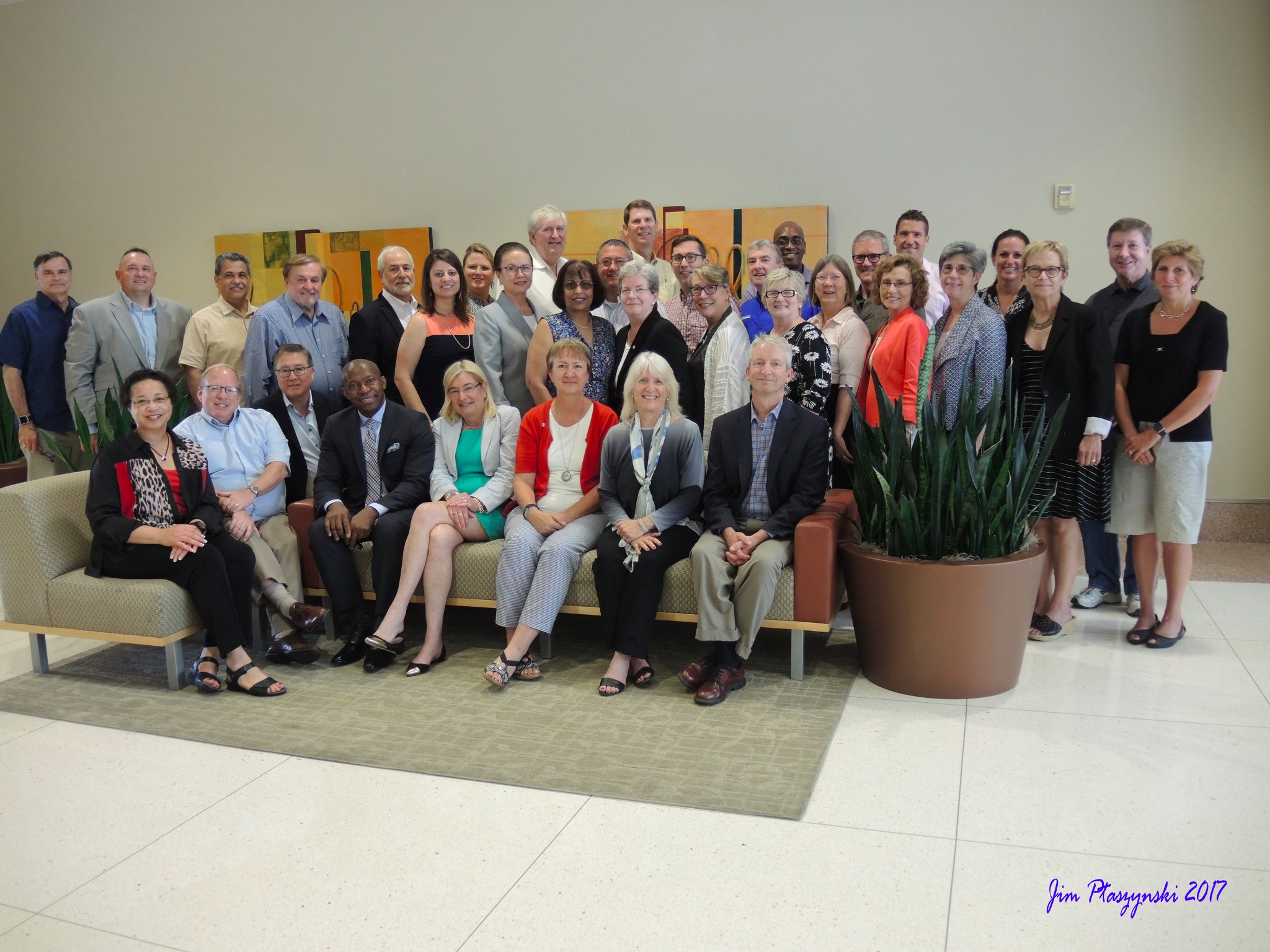 The digital fellows group, consisting of 30 provosts from a wide range of institutions, poses for a photo with program organizer Laura Niesen de Abruna.