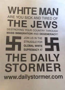 Poster credited to the white supremacist website The Daily Stormer, which appeared on several college campuses through remote hacking of printers. Poster text reads, "White man are you sick and tired of the Jews destroying your country through mass immigration and degeneracy? Join us in the struggle for global white supremacy at The Daily Stormer."