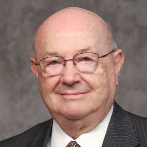 Alabama Community College System chancellor Jimmy Baker, a balding older white man wearing glasses.