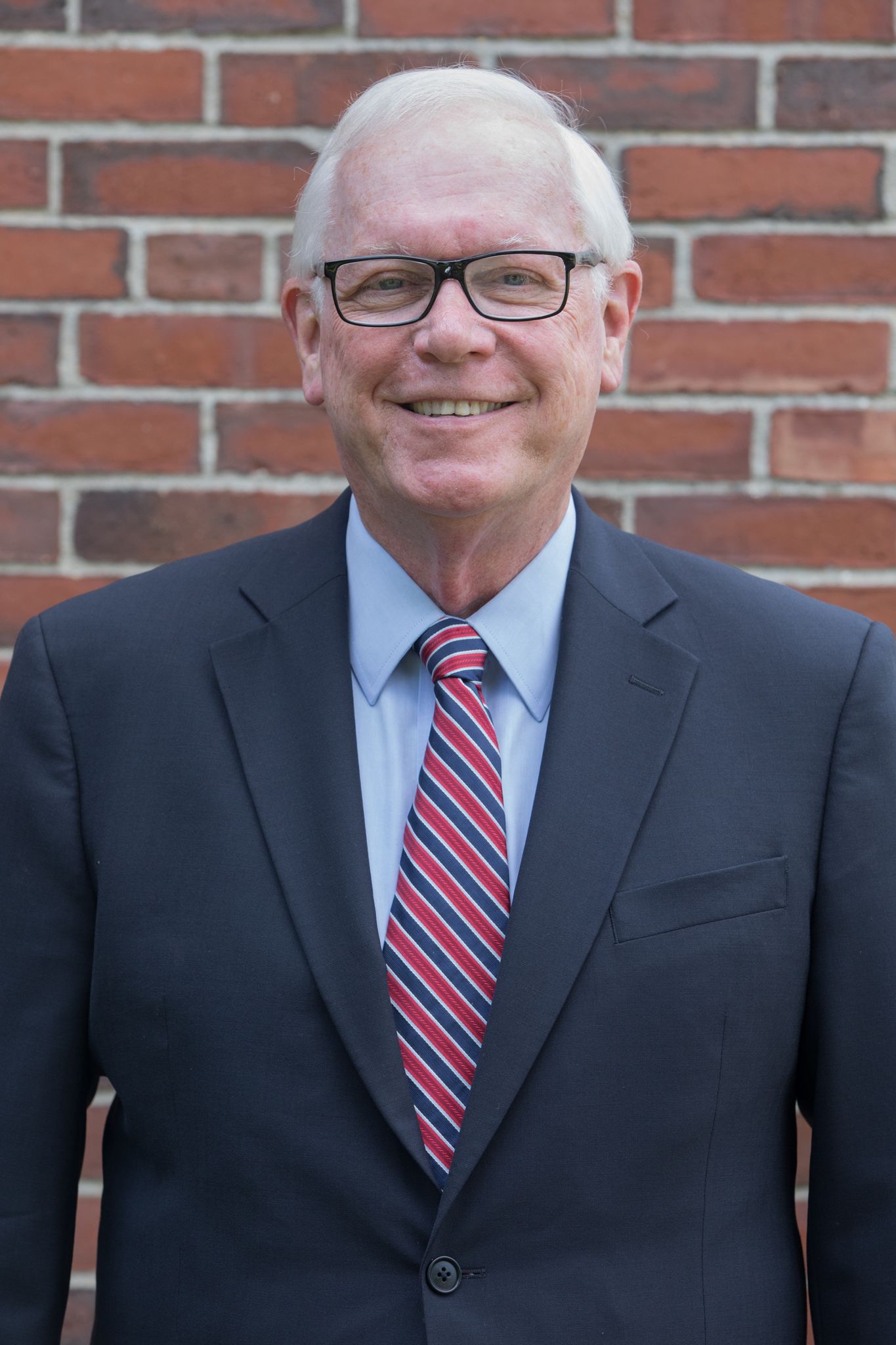 A headshot of Brian C. Mitchell