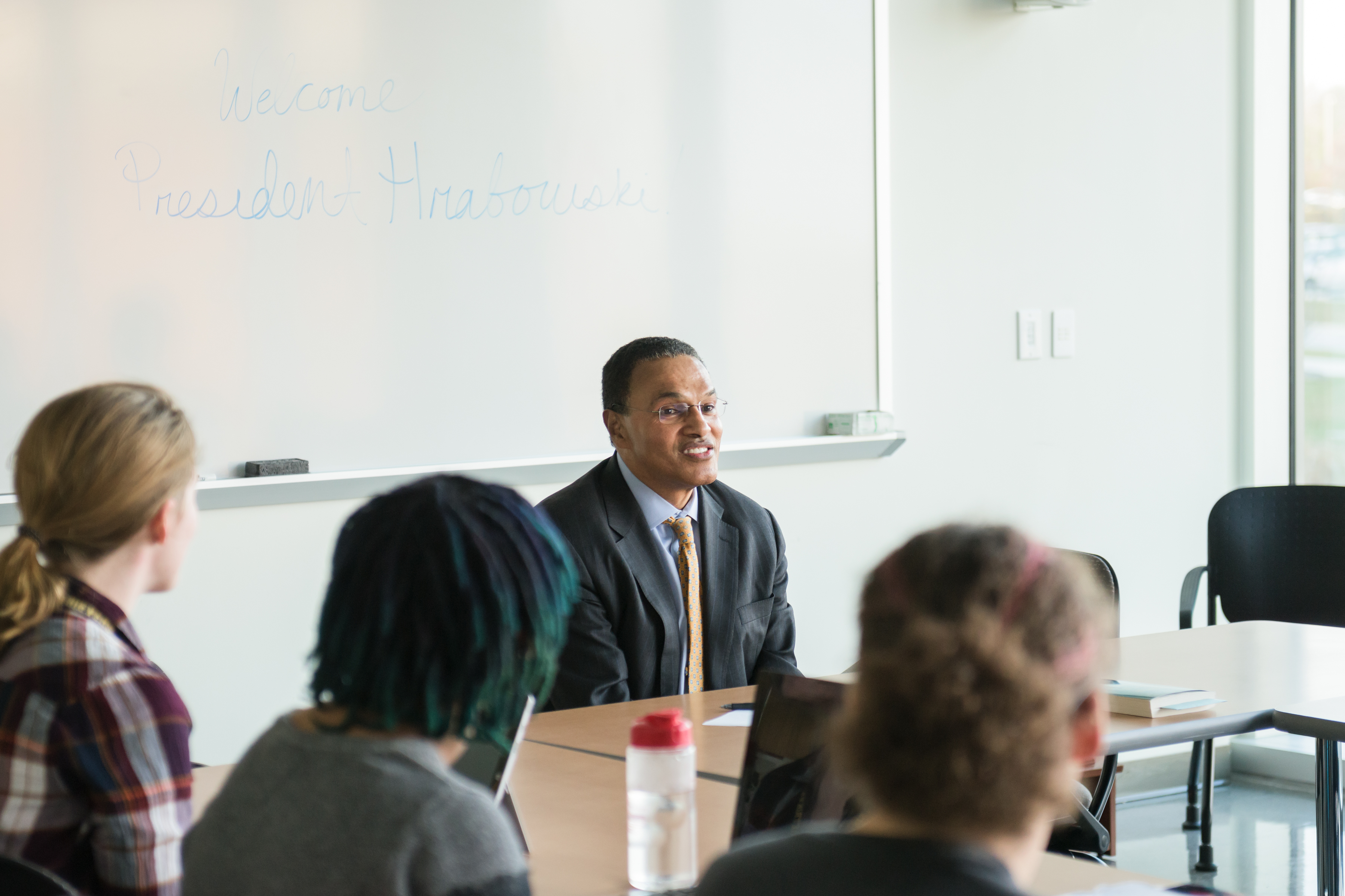 Freeman Hrabowski talks with students in class / Courtesy of UMBC