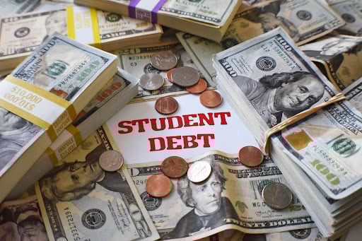 Graphic featuring "student debt" in red letters surrounded by paper money and coins.