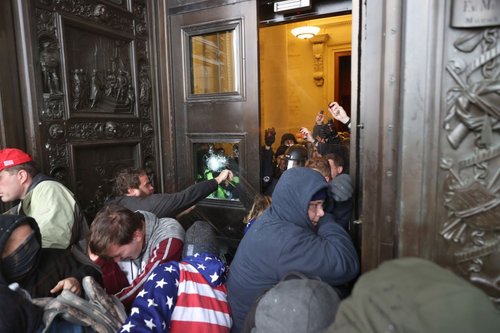 Rioters attempt to enter the U.S. Capitol Building.