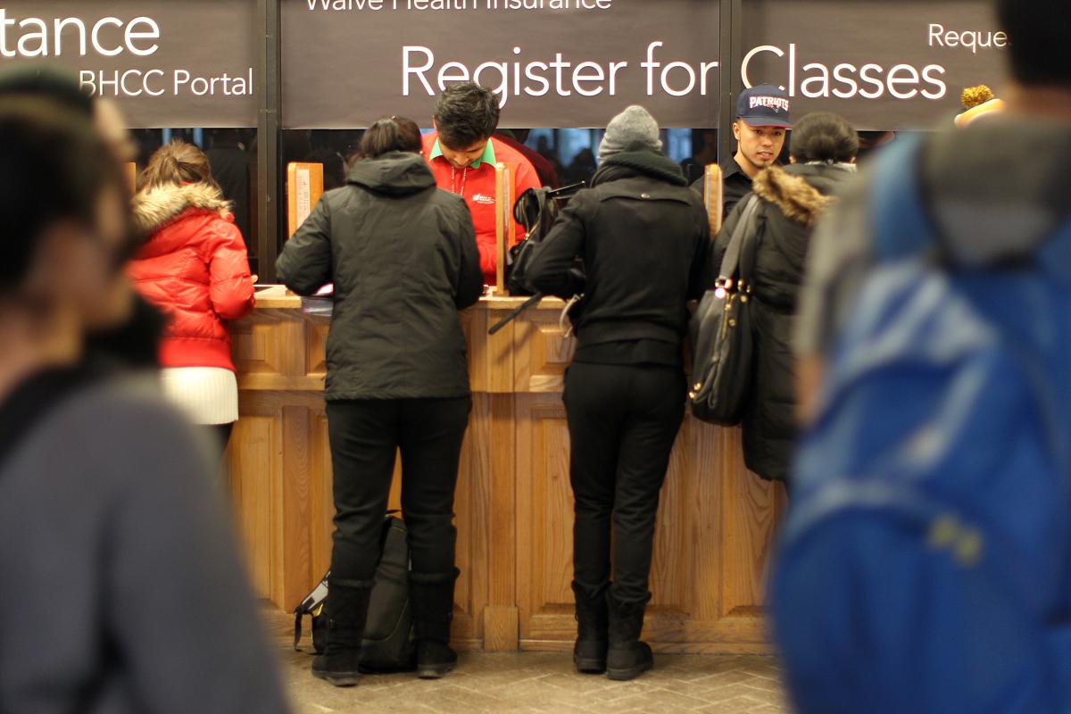 Adult students register for classes.