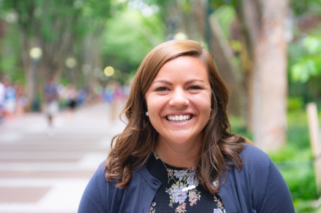 Jackie Recktenwald, a white woman with brown hair, smiles for a photo